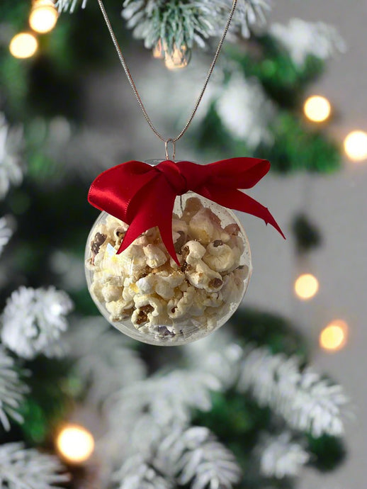 Christmas tree bauble filled with Crocodile doggy popcorn hanging from  xmas tree from My Happy Pet Online